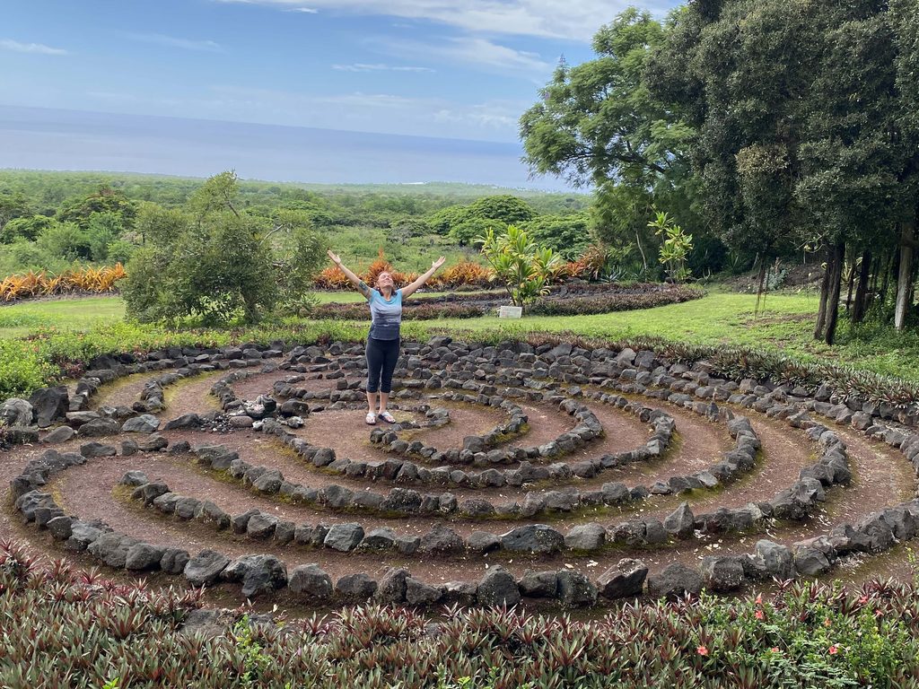Rayna on pilgrimage at Paleaku Gardens, Hawaii, 2021.